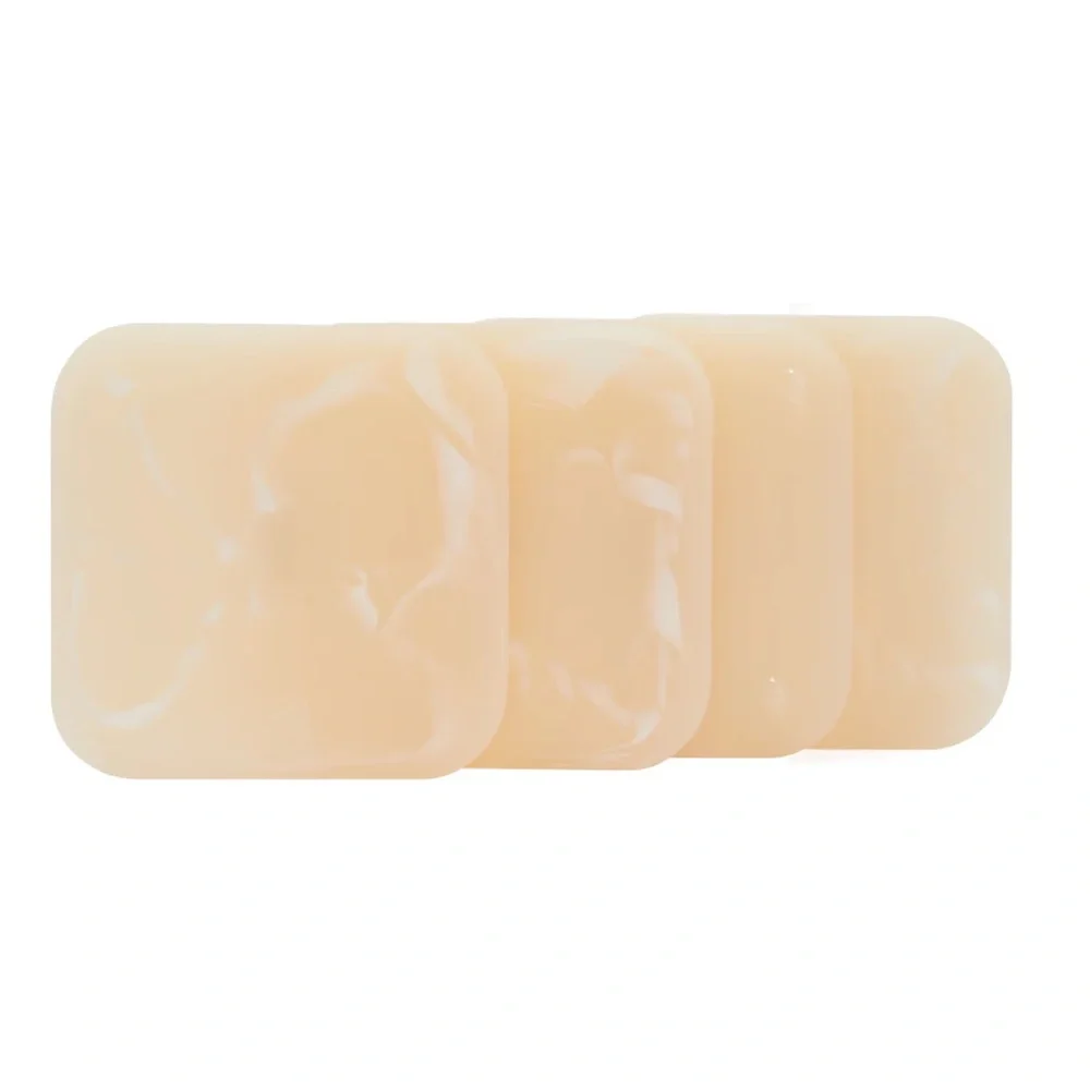 New in box Ririku resin coaster set of 4